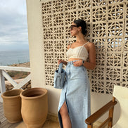 Détail jupe longue denim — couture en atelier — SYD DENIM Casablanca