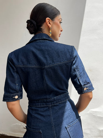 Détail combinaison denim — couture en atelier — SYD DENIM